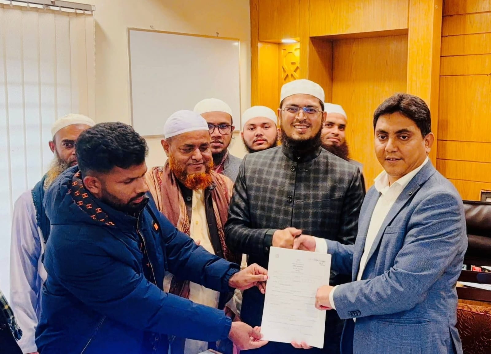 রায়পুরায় কুরআনের হাফেজদের নিয়ে মনোনয়ন ফরম সংগ্রহ ইসলামী আন্দোলনের এমপি প্রার্থী।